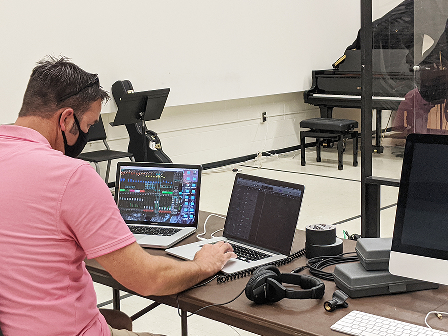 Dr. Wes Parker makes edits to a jazz combo project in the temporary recording studio space in Price Music Center.