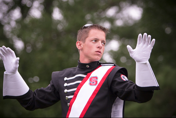 photo of Mark Whitfield wearing his NC State drum major uniform while he was a student at NC State