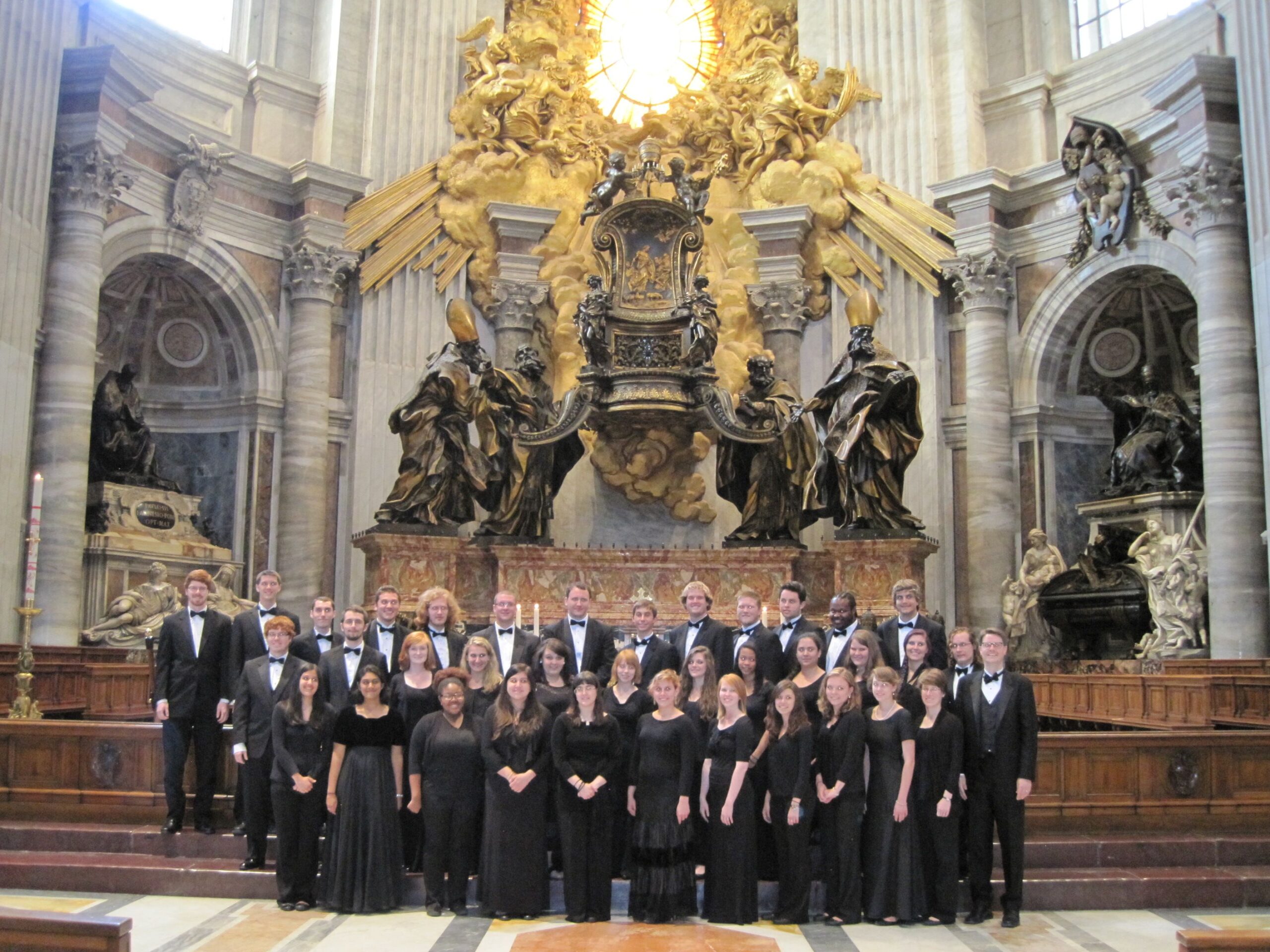 Choir posing for a photo at St. Peter’s Basilica 