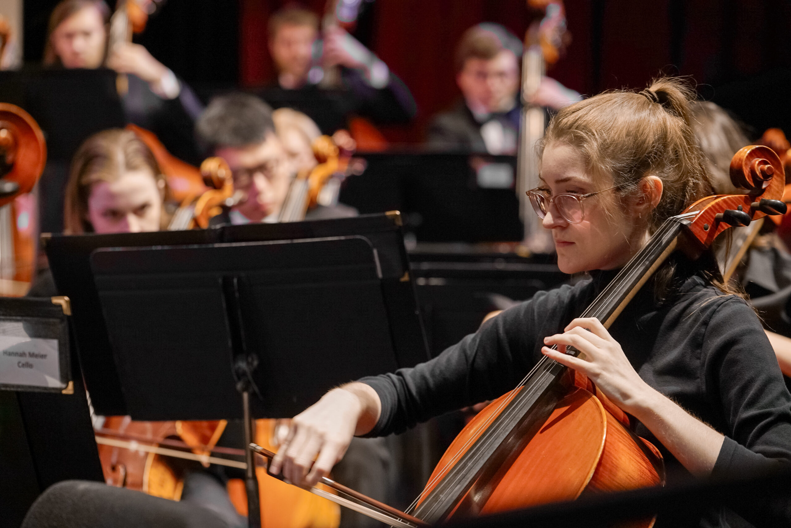 Student performs in an orchestra concert.