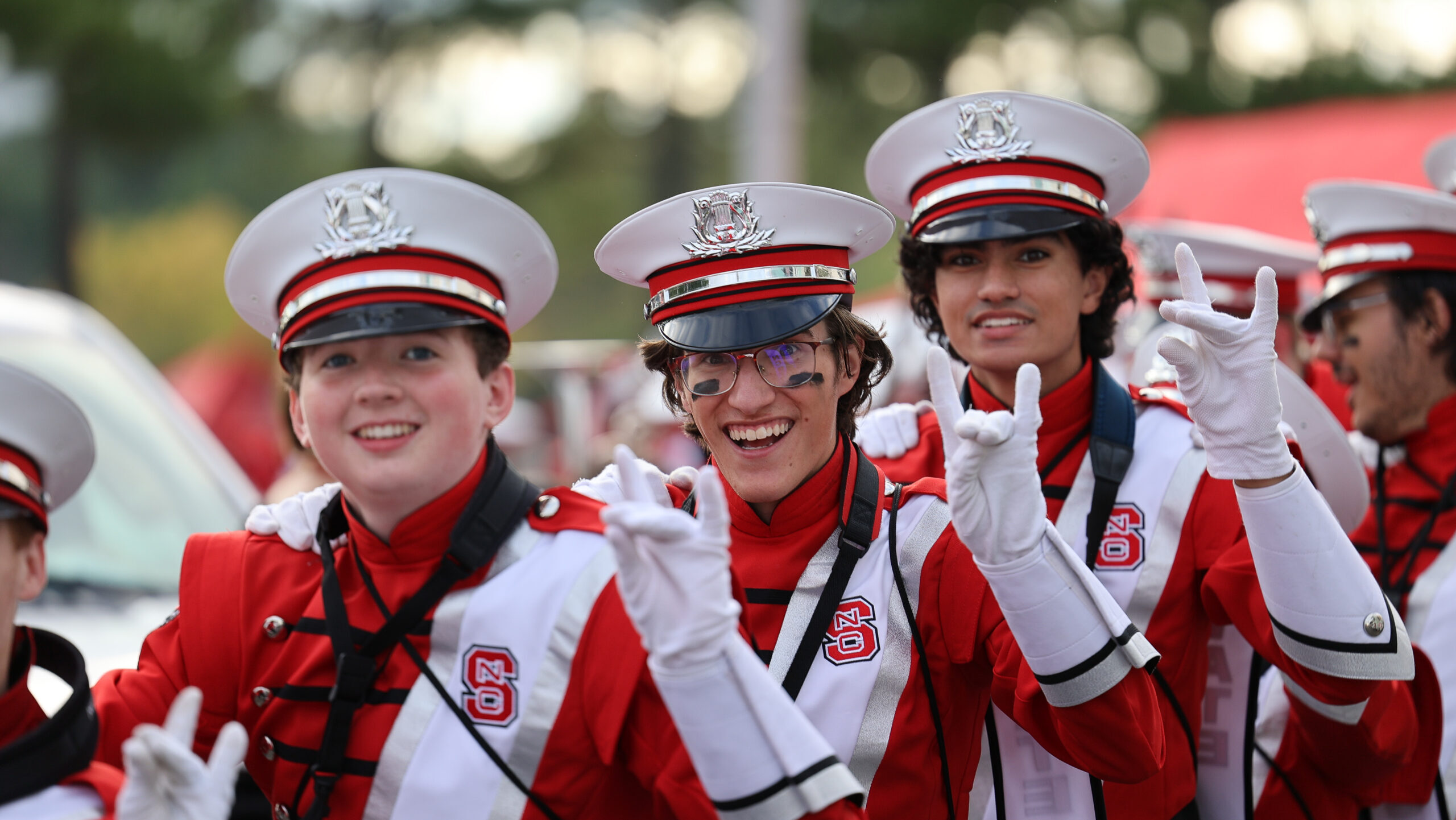 marching band students pose for a picture.