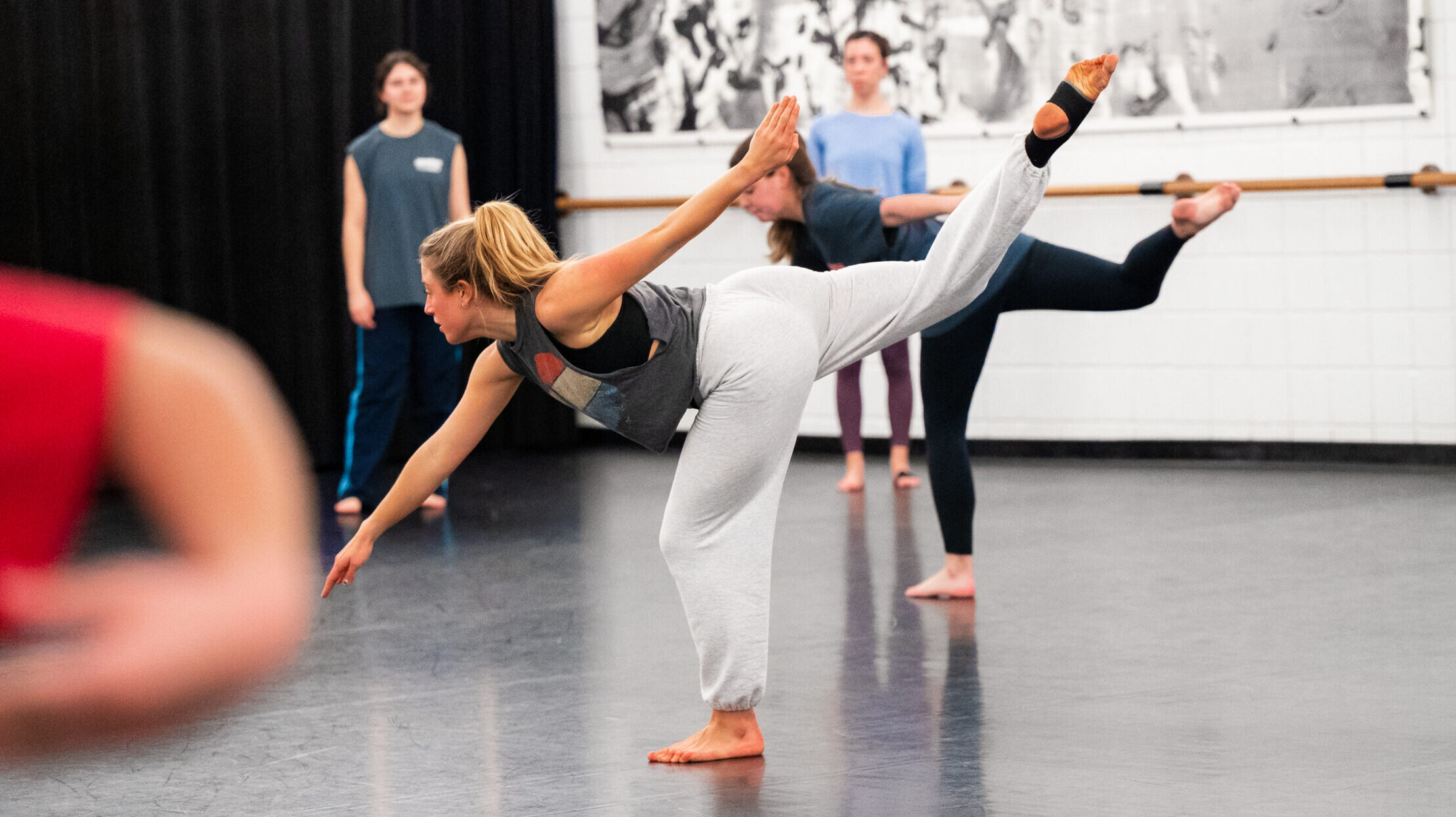 dancers rehearsing in a studio.