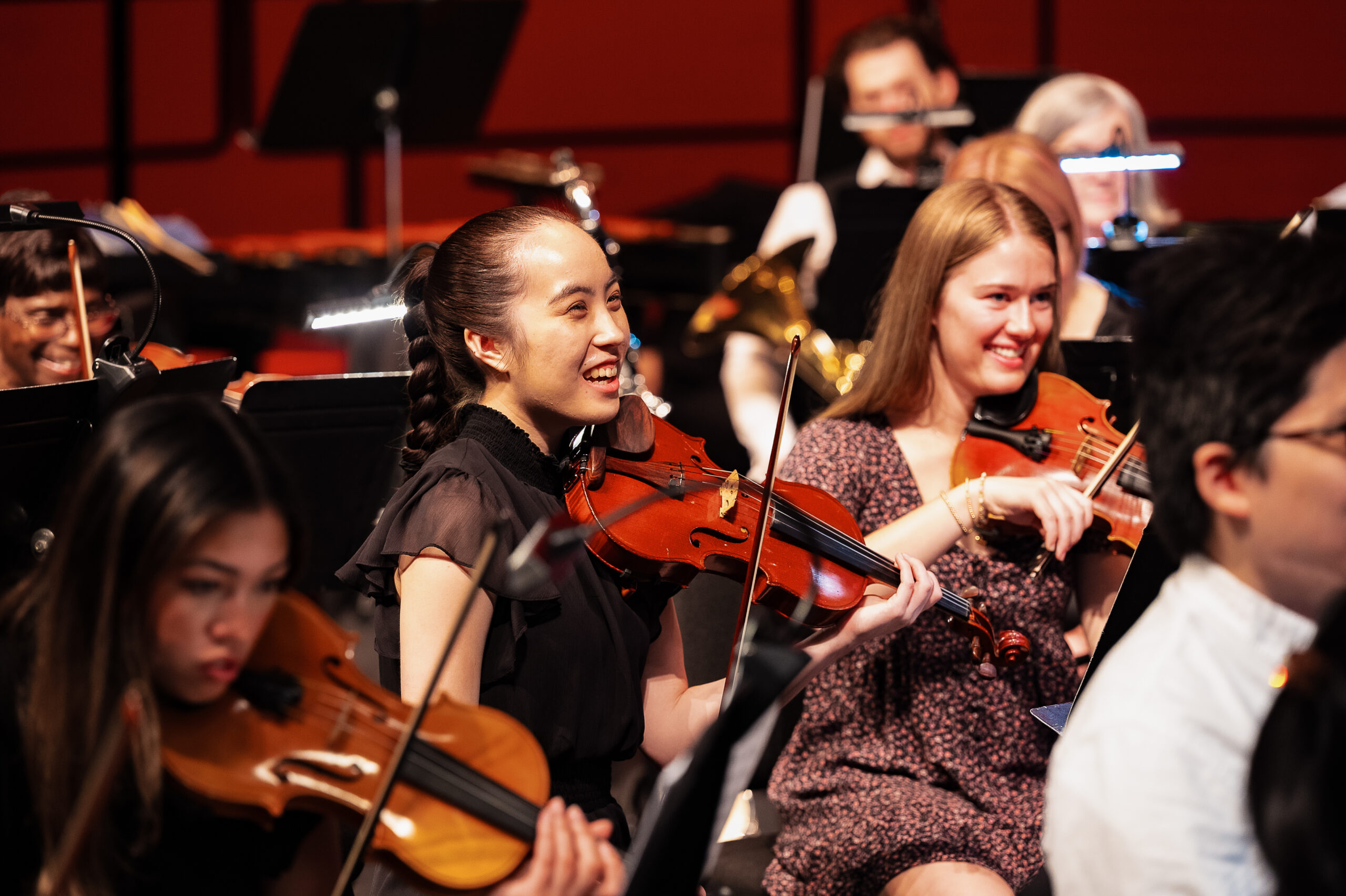 Photo collage of student and community musicians in the orchestras.